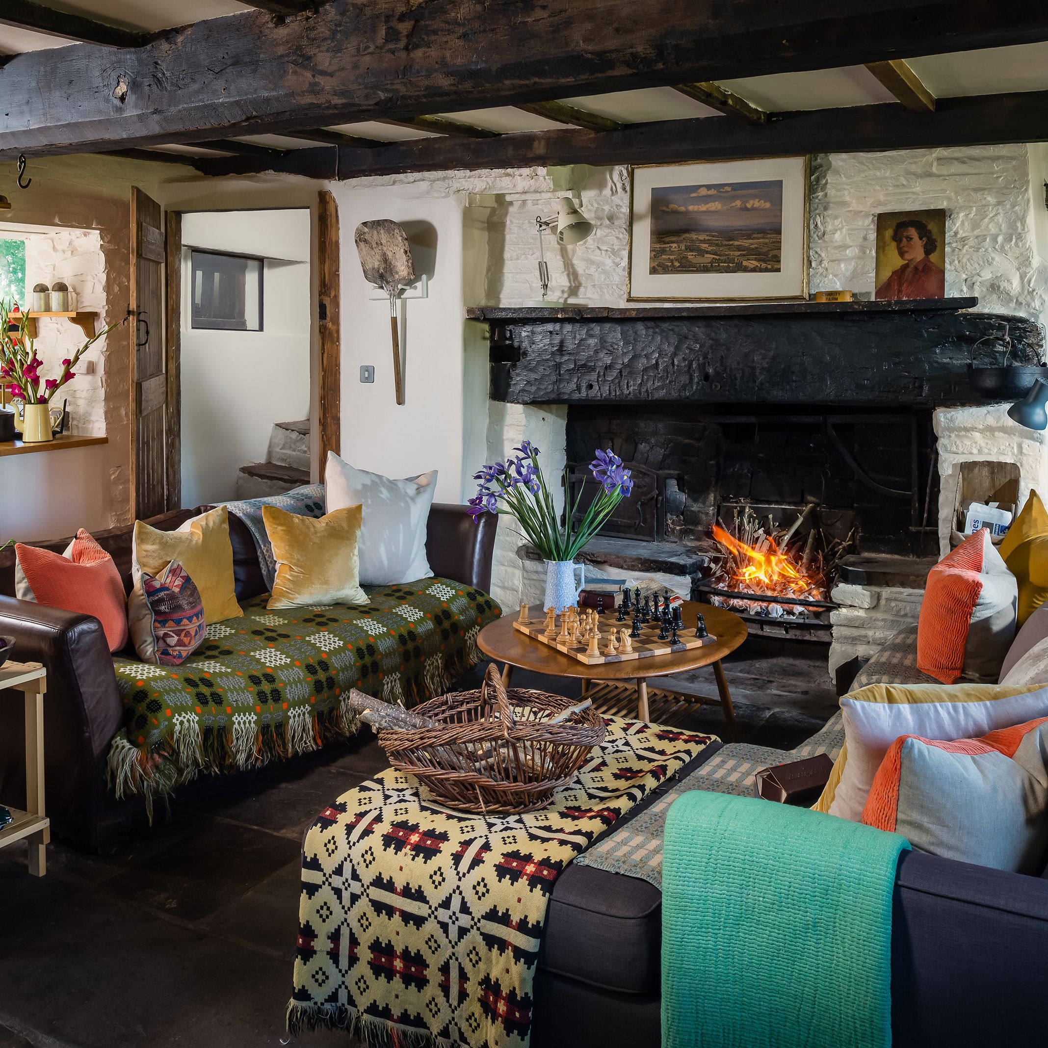 A layered rug arrangement providing plush comfort underfoot in a bedroom.