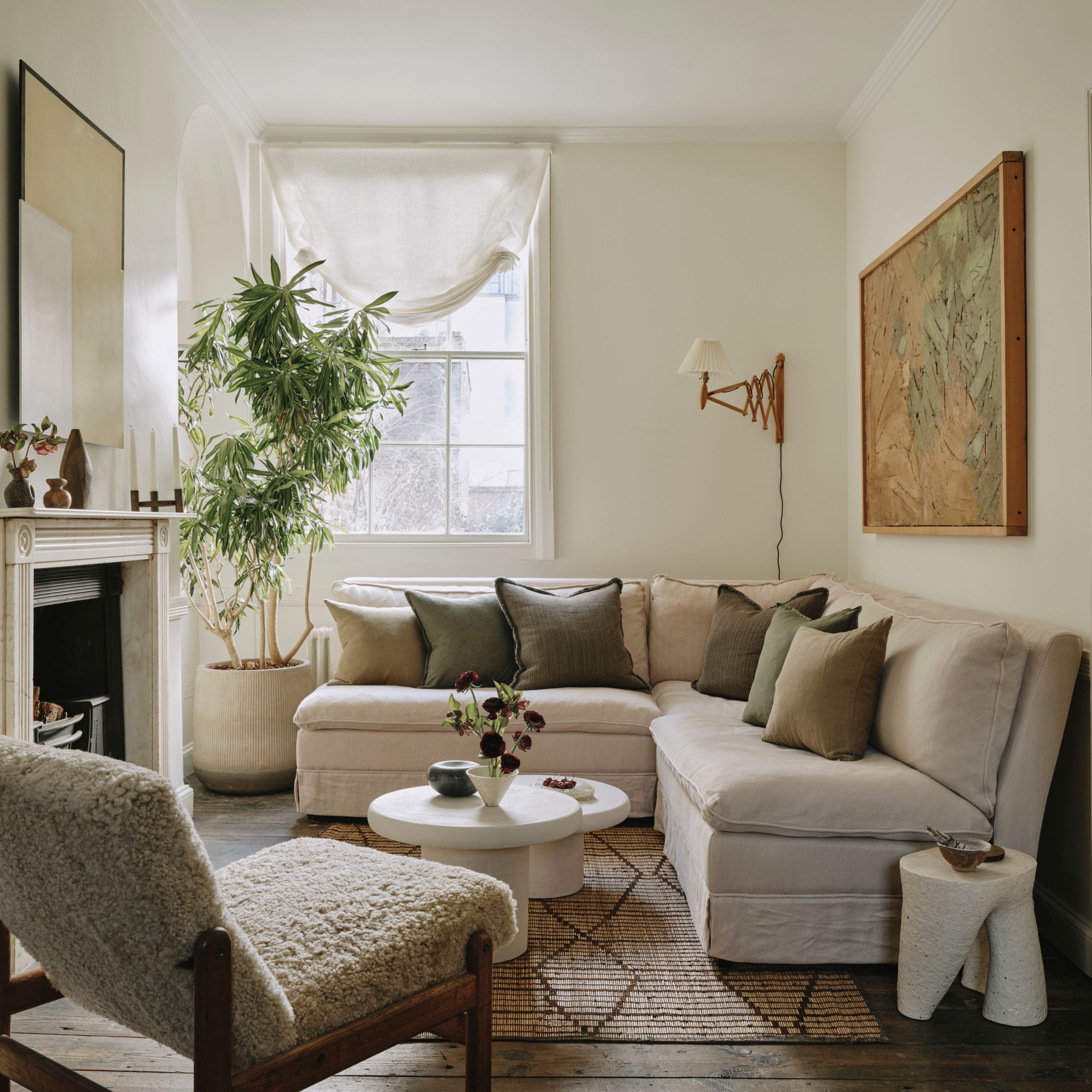 A tiny house interior showcasing optimized space with a mezzanine bed and integrated storage.